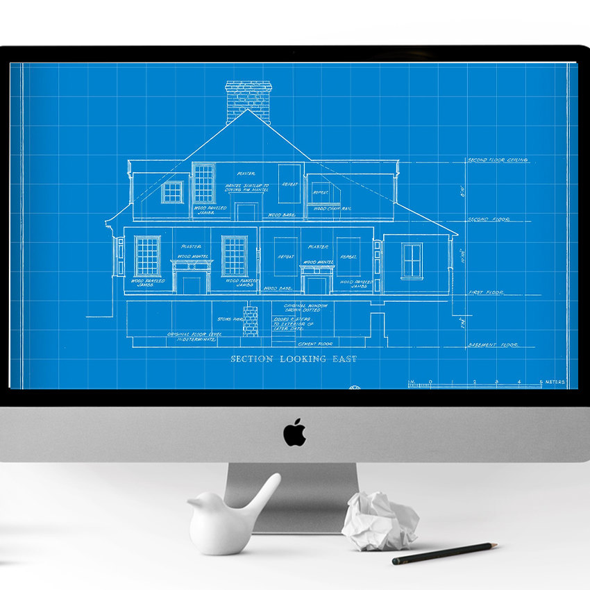 Computer with house blueprint on the screen. Website costs the same as a house